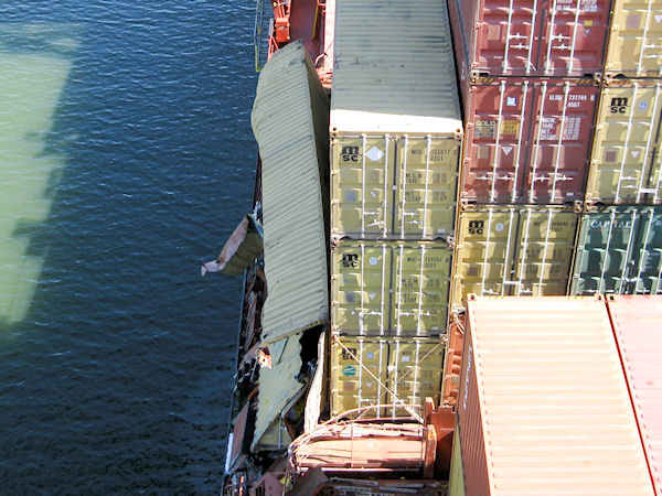 Damaged containers sit on the deck of the motor vessel Nederland near the Bayport Ship Channel and Houston Ship Channel intersection near light 75, Oct. 29, 2011.Coast Guard Sector Houston-Galveston received a report that the motor vessel Nederland, a 782-foot containership, and the motor vessel Elka Apollon, a 799-foot chemical tanker, collided.Official U.S. Coast Guard photo. 